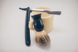 Image of a razor, soap and brush, used to illustrate post.